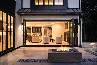 Looking into a home from a patio through a Marvin Elevate Bi-Fold door.