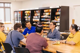 Marvin employees talking and eating lunch