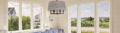 Dining Room With View Of The Coast Through Marvin Windows And Doors